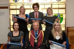 Five graduates from St George's University School of Veterinary Medicine (SGUSVM), in the Caribbean island of Grenada, have passed the Statutory Membership Examination of the UK's Royal College of Veterinary Surgeons