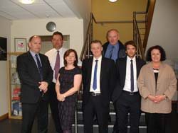 Photo L-R: Hugh Gibson, Mark Stanton, Margaret McGuiness, Iain Rivers, Stuart Wade, Chris Hill, Juliette Devlin